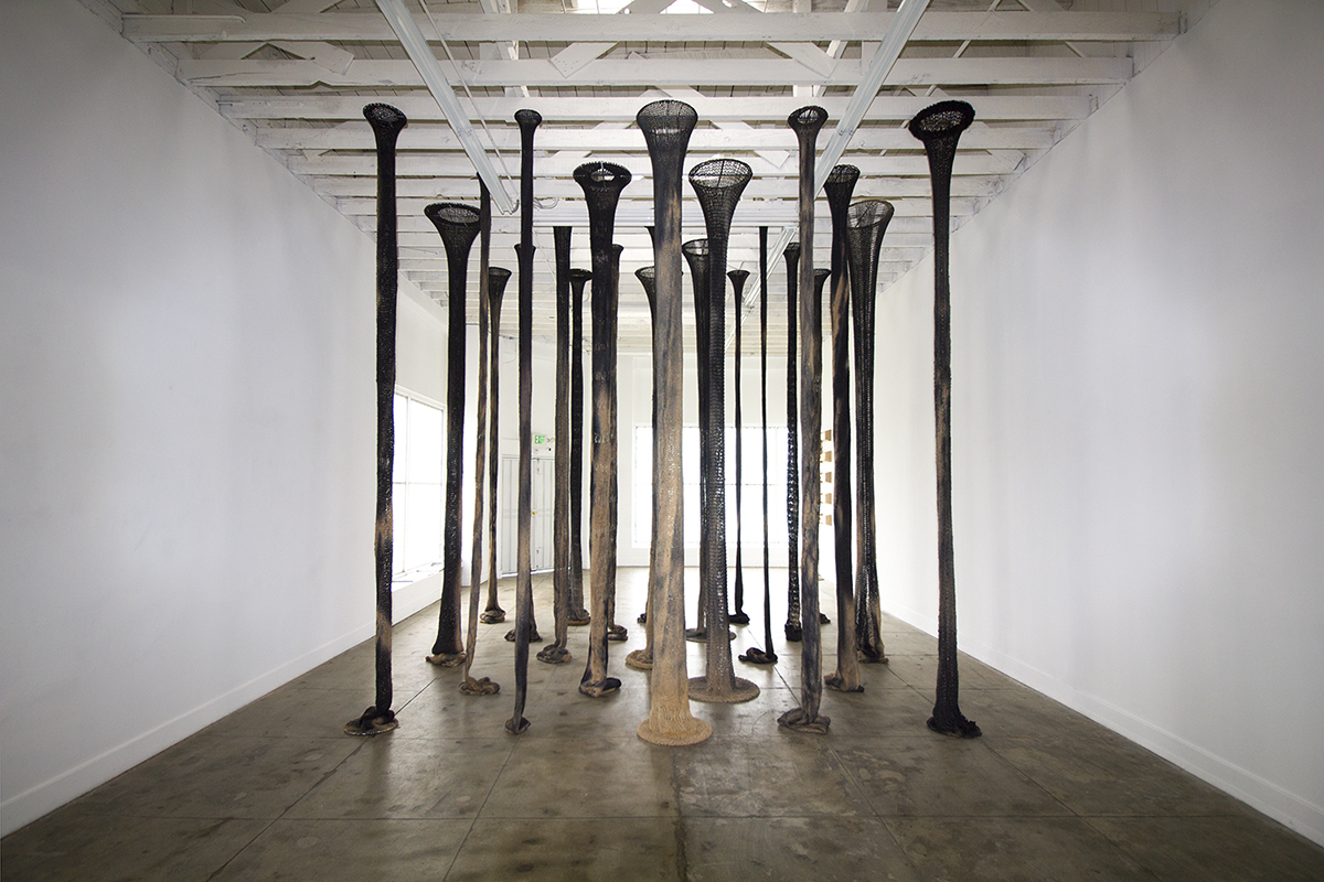 23 Columns by Claudia Parducci, Jute, Procion MX dye, steel, 192 x 168 x 180 inches (variable)