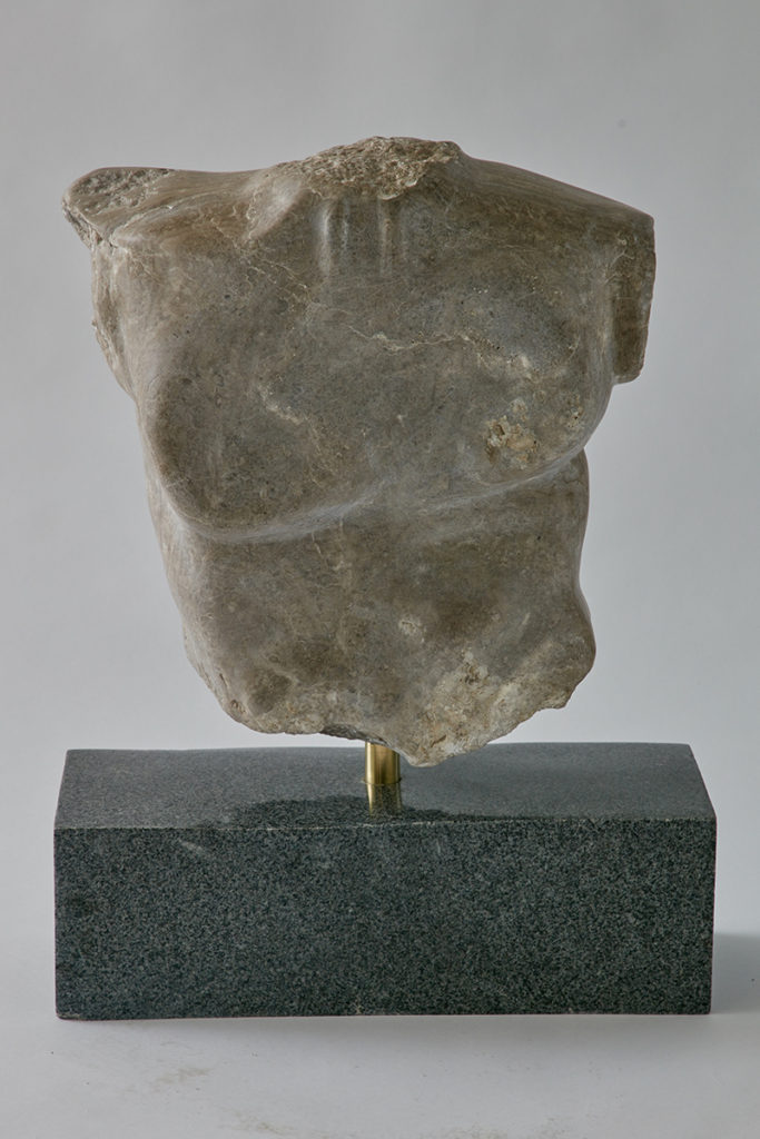 A sculpture of male torso