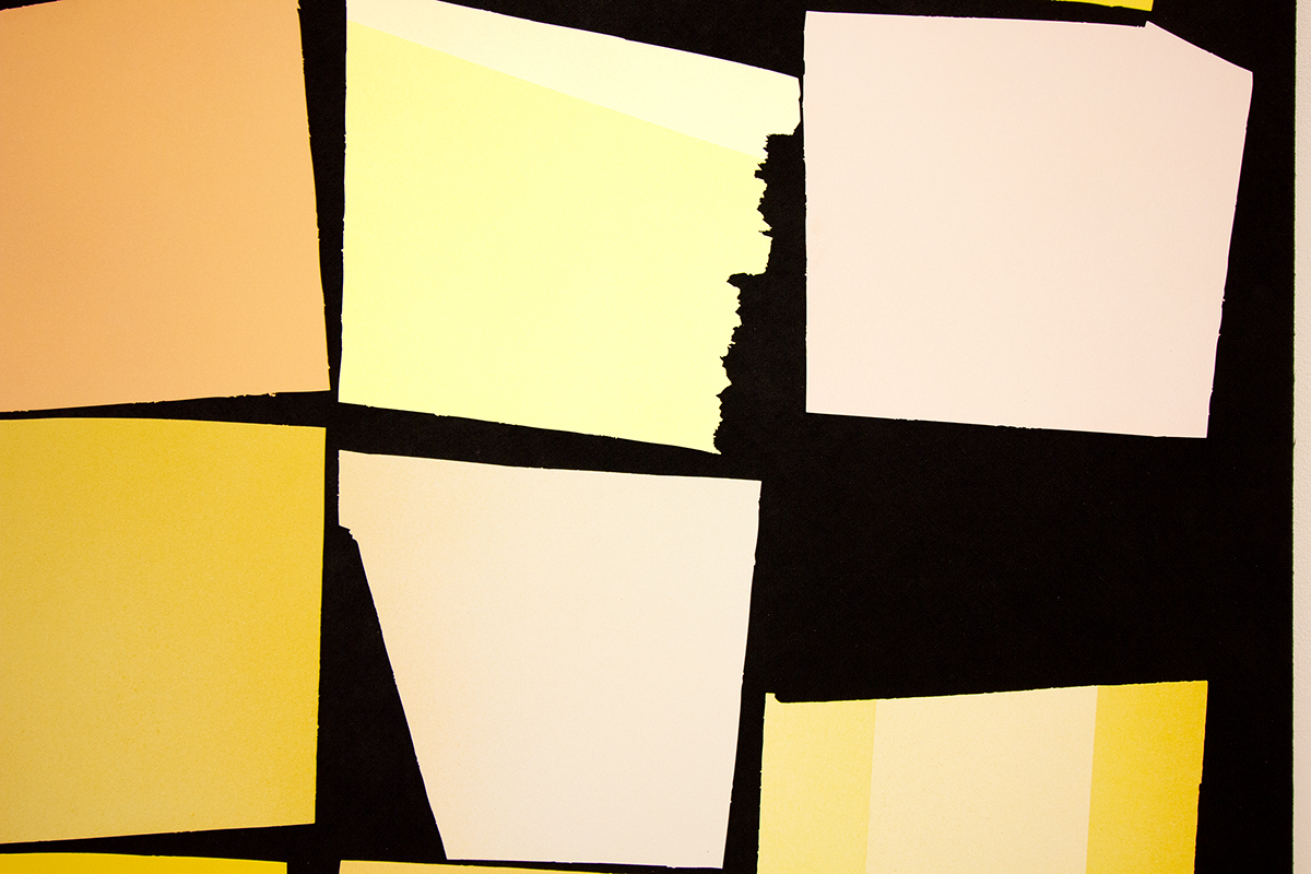 A detailed image of a work that features a black panel that has yellow papers collage on the surface